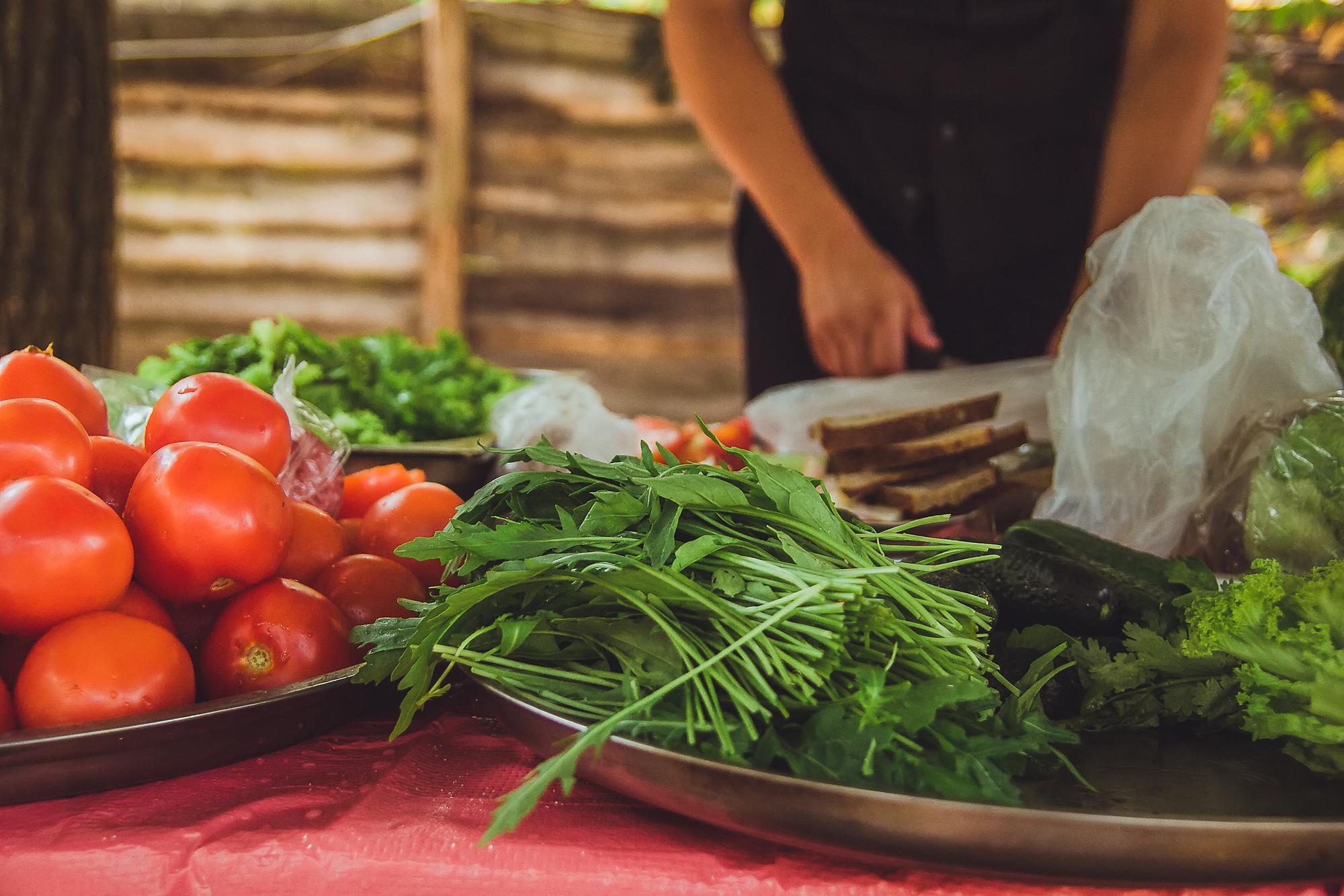 Close-up of fresh local ingredients on wooden table